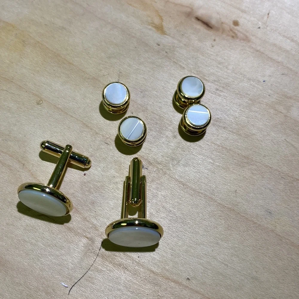 Set of 5 tie and cumber bun sets along with cuff links and buttons